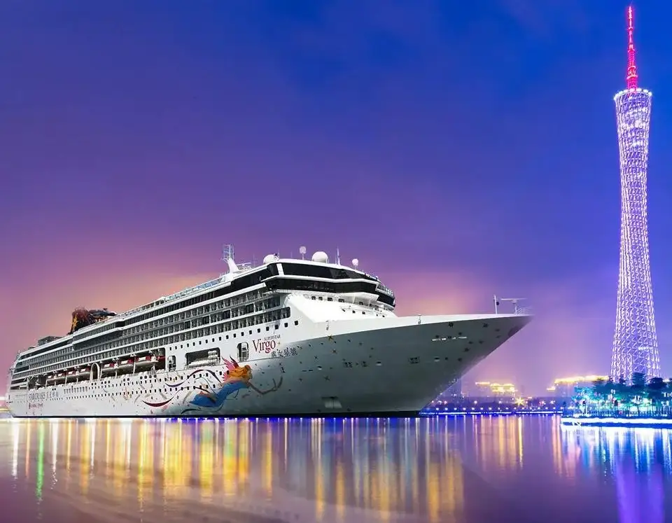 cruise-ship-anchored-beside-a-tower